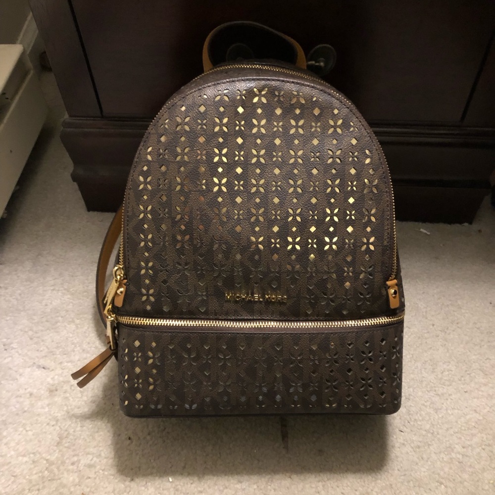 Like New Michael Kors Perforated Backpack